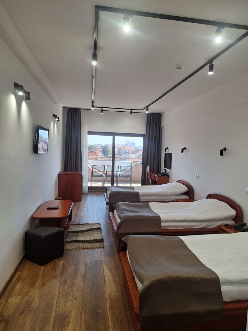 Deluxe Triple Room with Balcony